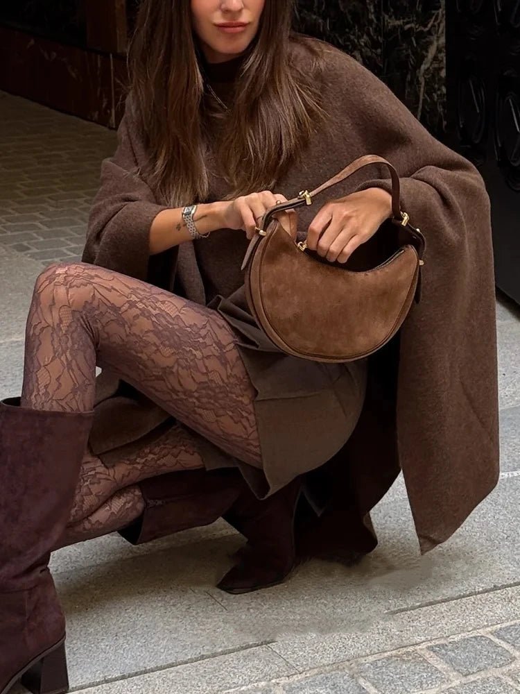 Adelinka gebreide poncho