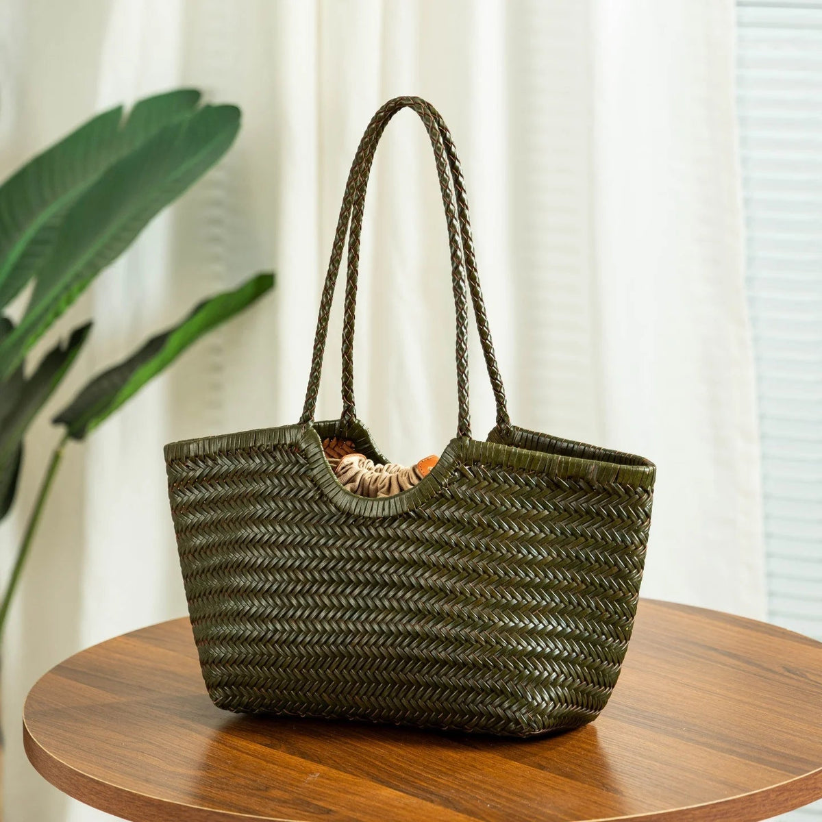 Alba Handwoven Tote Bag in Green, small size, worn on shoulder