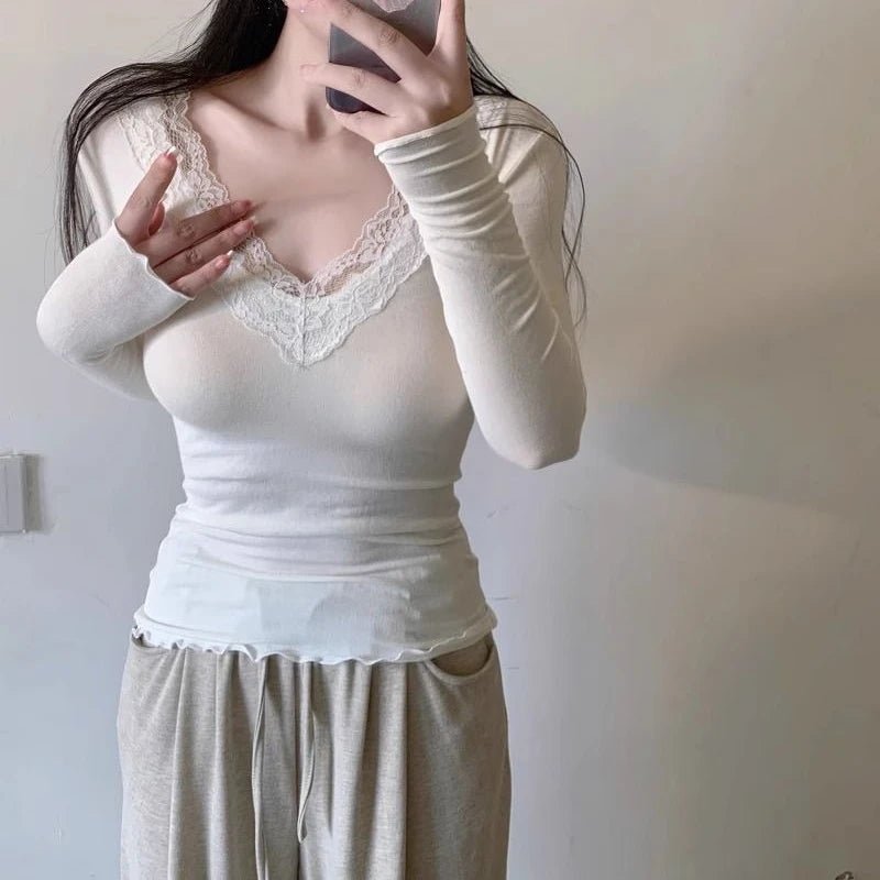 Aurora Top in pizzo con scollo a V