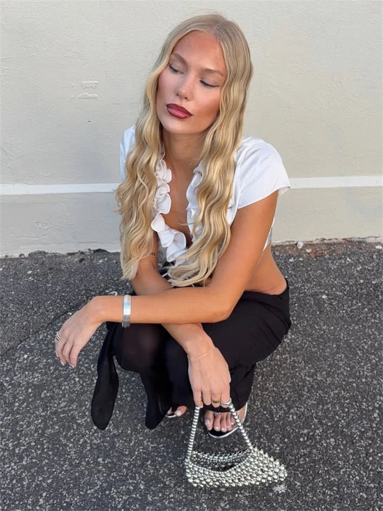 Top corto Bianca con volantes y cordones