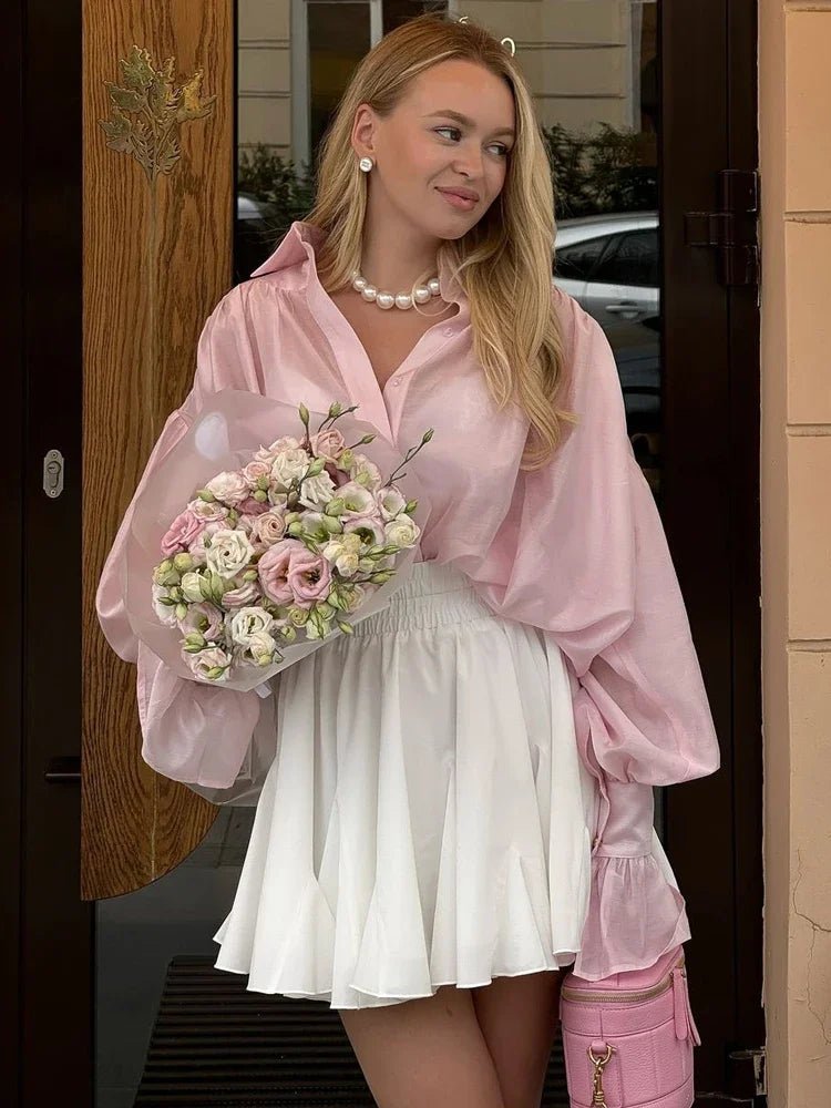 Brielle genomskinlig blus med knappar