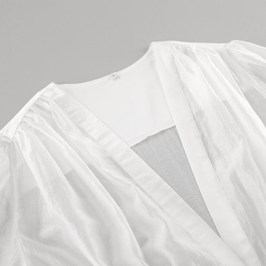 Blusa transparente abotonada con escote pronunciado Elisa