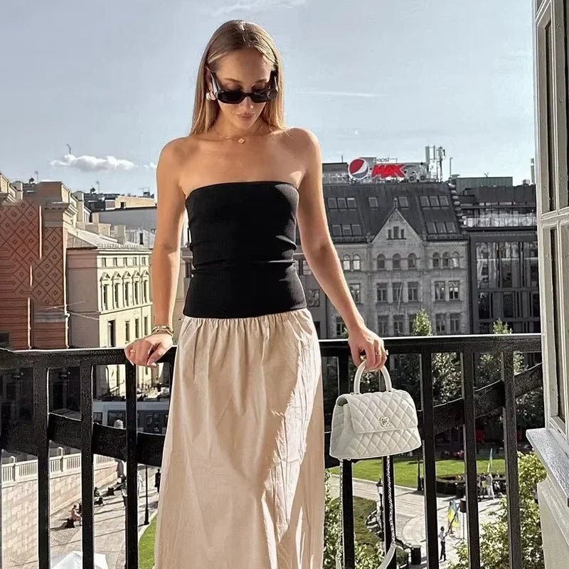 Hannah maxikjole med kontrastdetaljer og Honor-design