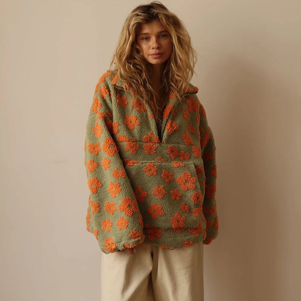 Oversized striksweater med lynlås