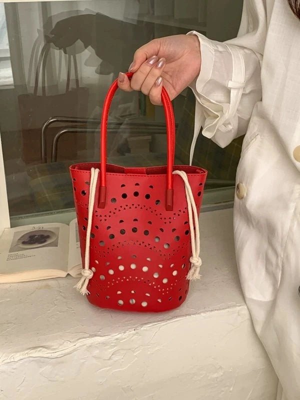 Borsa a secchiello traforata Lara