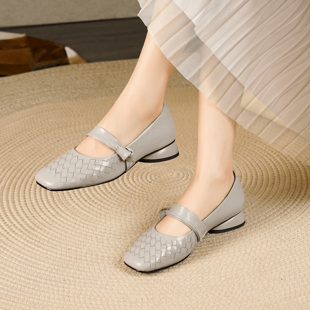 Scarpe basse in pelle intrecciata Lisbeth