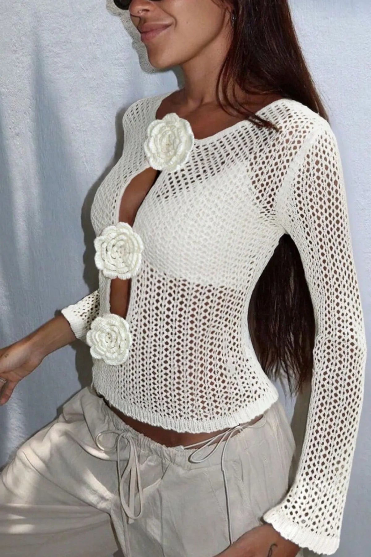 Prenda de crochet con flores para cubrir Marley