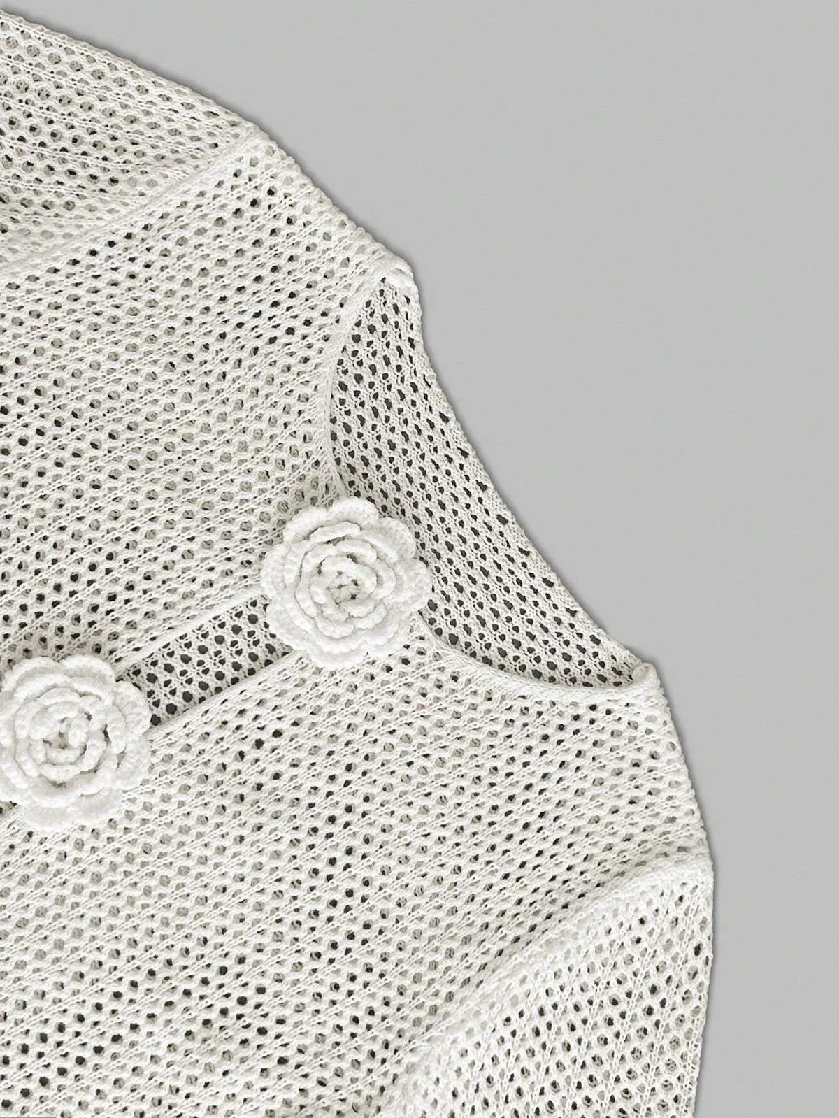 Prenda de crochet con flores para cubrir Marley