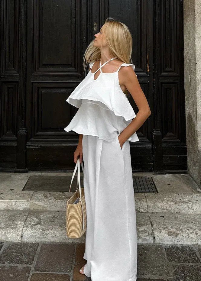 Conjunto Mila de top fluido com folhos e calças de perna larga