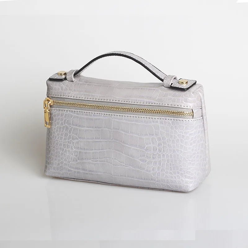 Minerva-clutch med krokodillemønster