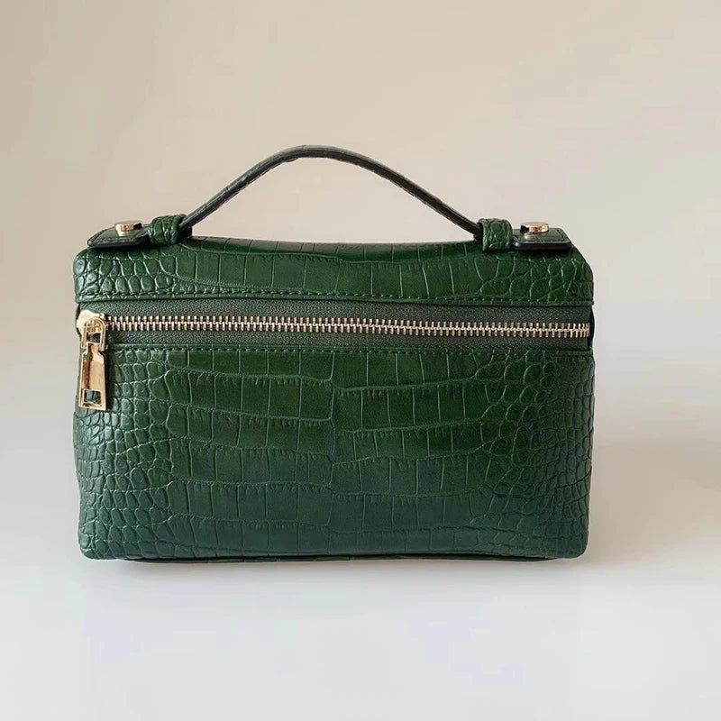 Minerva-clutch med krokodillemønster