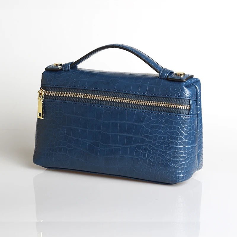 Minerva-clutch med krokodillemønster