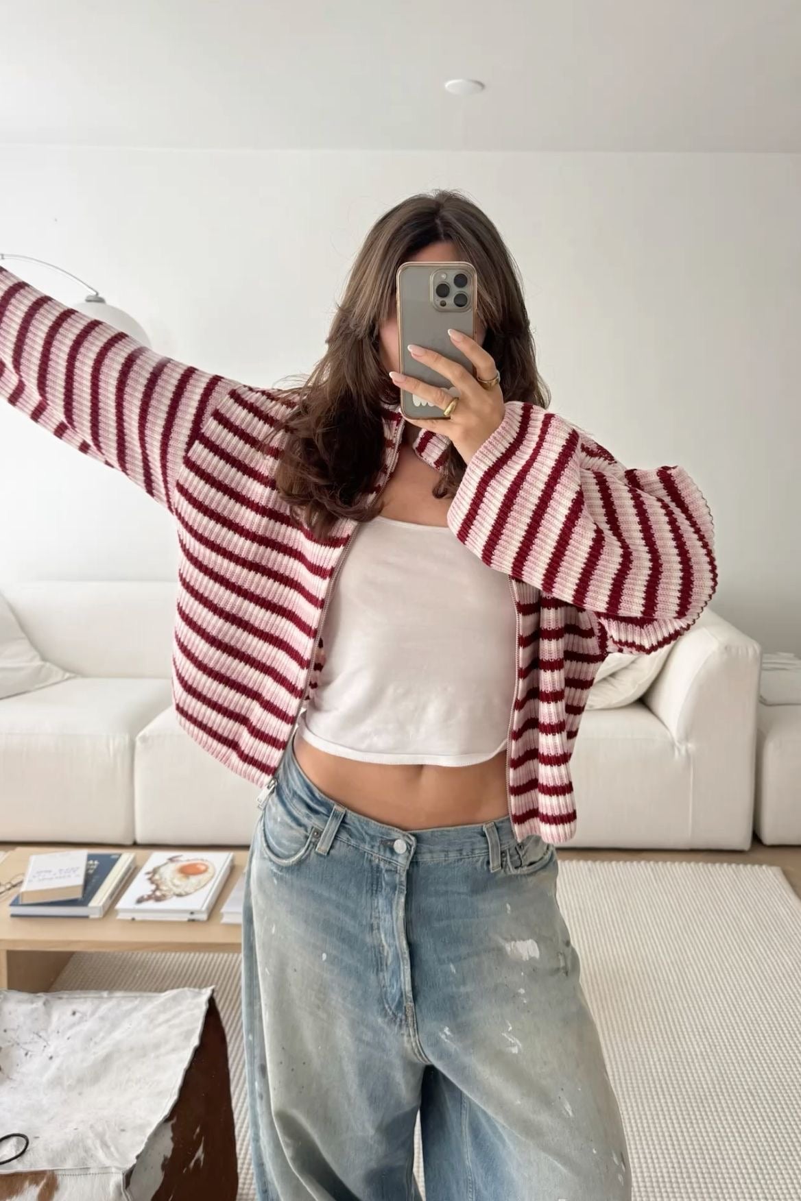Oversized ριγέ πλεκτό πουλόβερ Nora με φερμουάρ