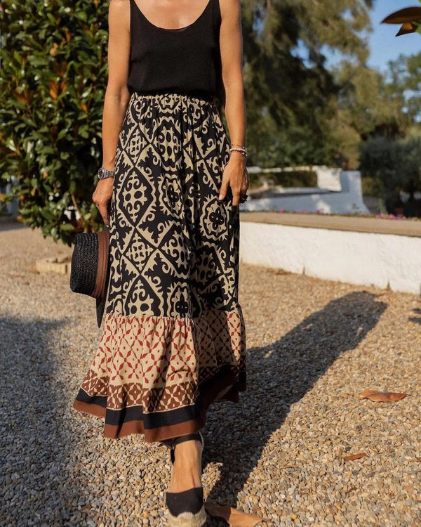 Rhea-boho-midinederdel med print og svaj