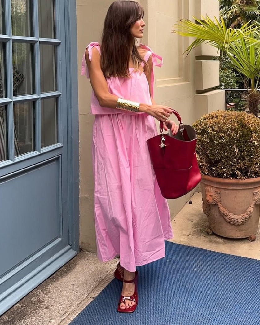 Abito midi rosa Sophia con fiocco e balze