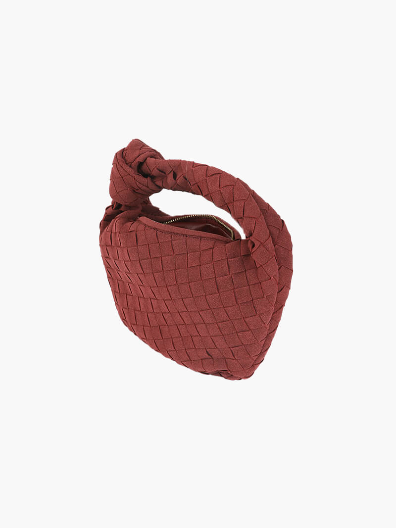 Mini bolso de mano de ante trenzado