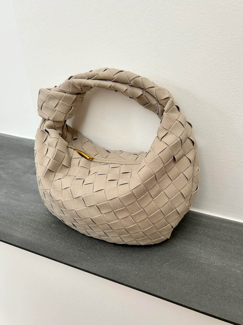 Mini bolso de mano de ante trenzado