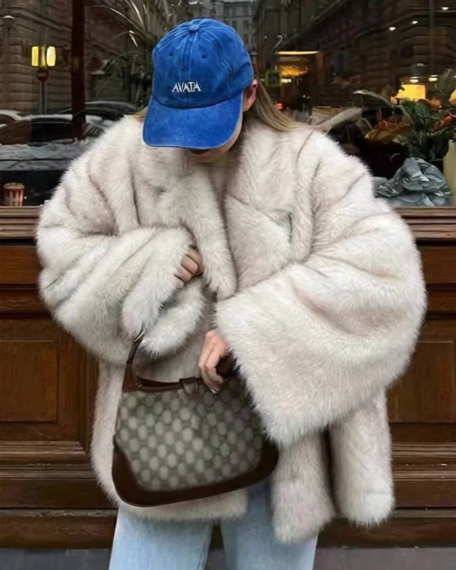 Tilda kåpe i imitert pels