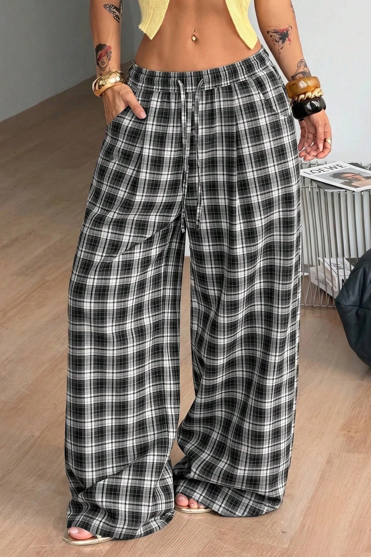 Saga Plaid Drawstring Wide-Leg Pants in black plaid – styled look